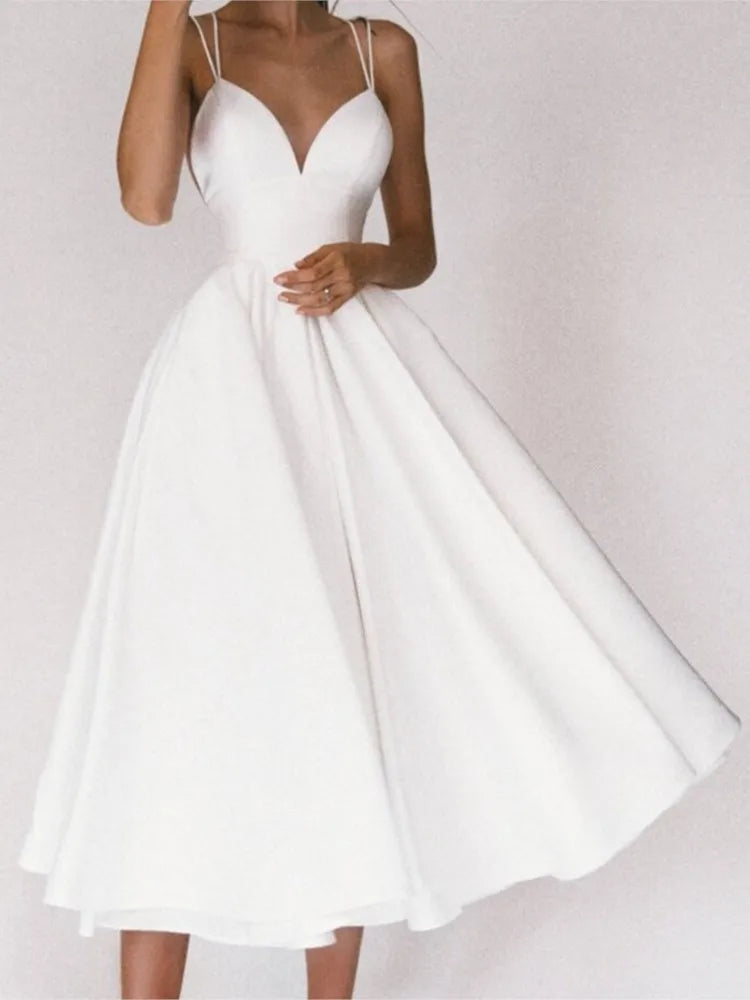 New Spaghetti Strap Solid Color Sexy V-neck Backless Dress