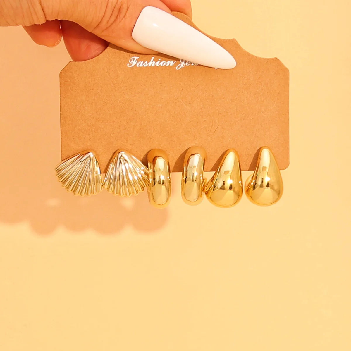 9-Pair Golden Resin Earrings Set – Starfish, Seashell &amp; Textured C-Shape Collection