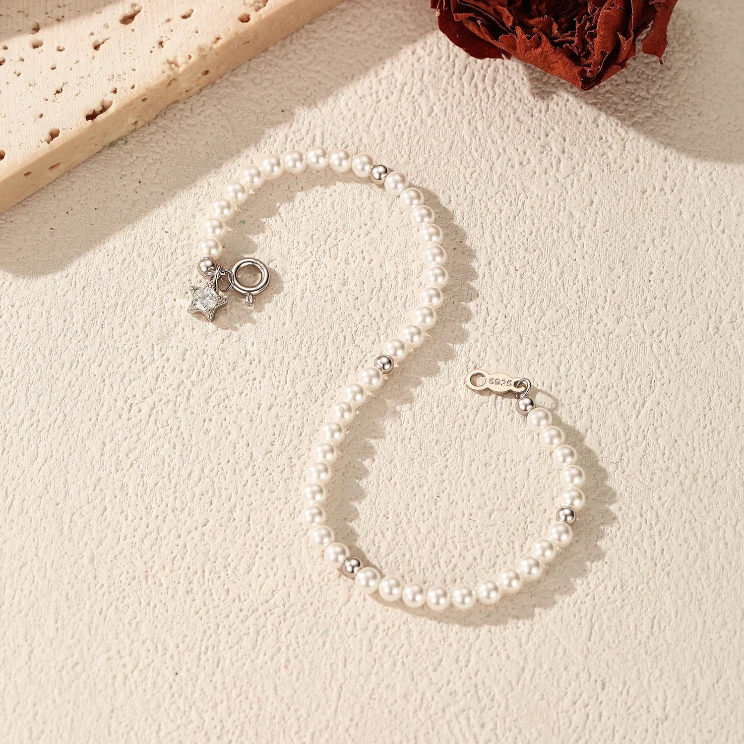 Elegant Pearl & Star Bracelet