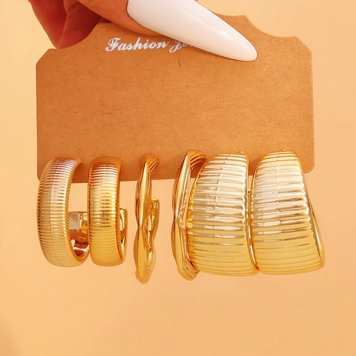 9-Pair Golden Resin Earrings Set – Starfish, Seashell &amp; Textured C-Shape Collection