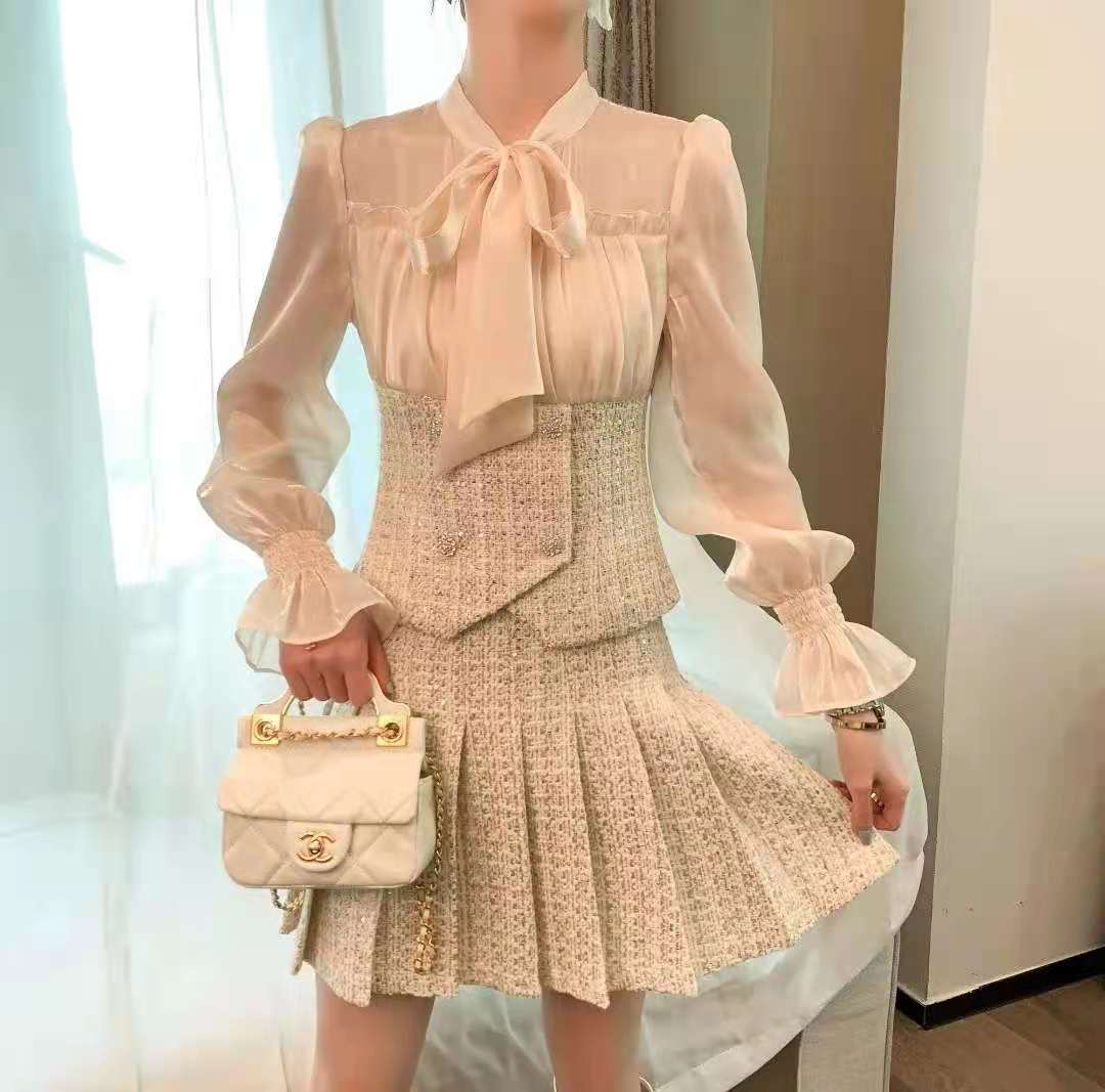 Bow Bandage Design See Through Long Lantern Sleeve Blouse + High Waist Short Pleated Skirts Two-piece Suit