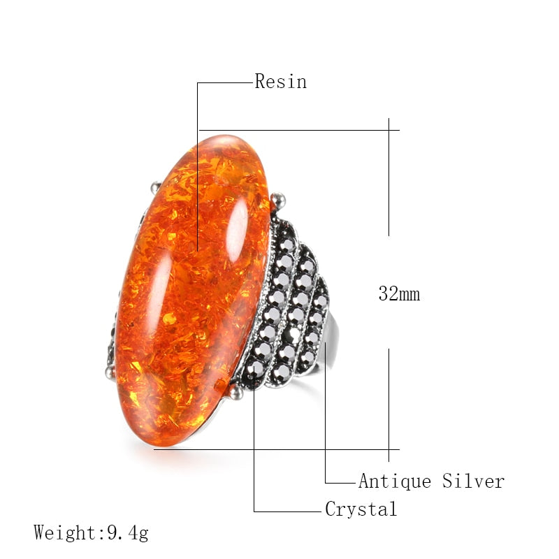 Big Oval Simulated Ambers Stone Ring