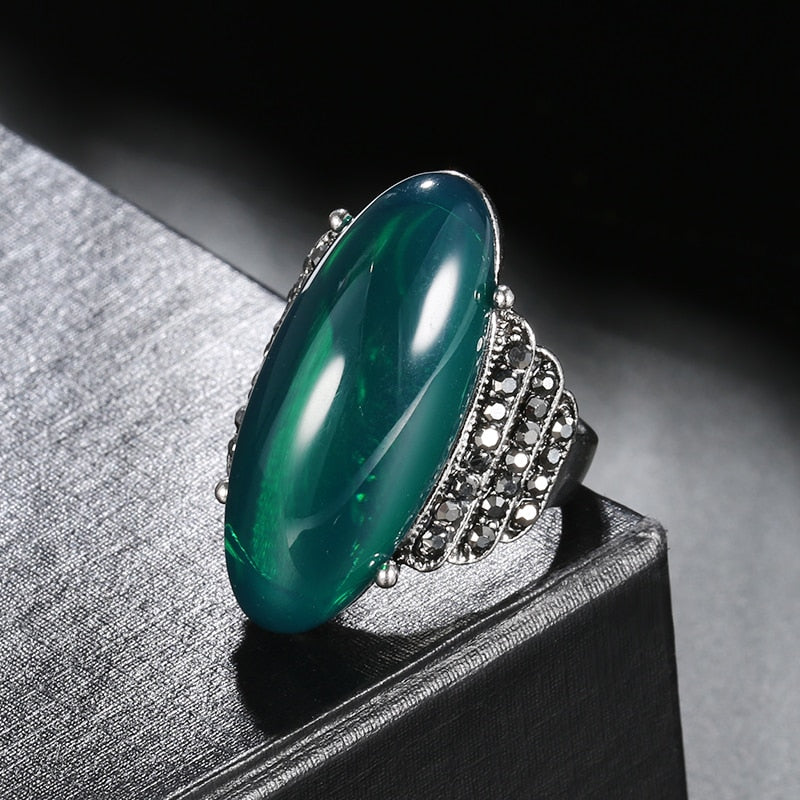 Big Oval Simulated Ambers Stone Ring